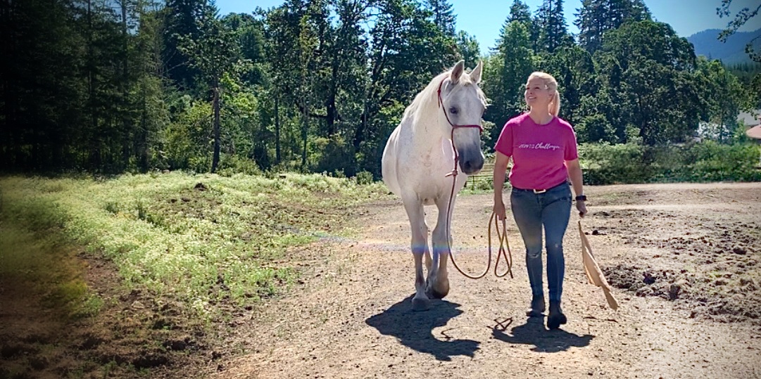 Emma daily kline and her lipizzan Nigel walking with a heart full of the language of love in horsemanship